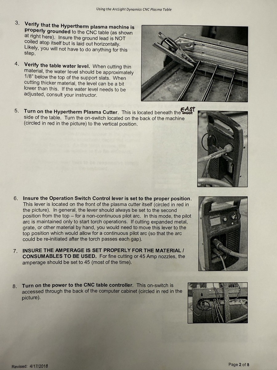 Arclight CNC plasma table showing air supply, water table, and ground clamp setup